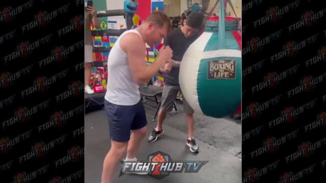 CANELO ALVAREZ SHOWS BRANDON MORENO HOW TO THROW HOOK TO THE BODY! AS THE TWO MEXICAN CHAMPS MEET!