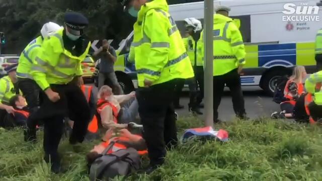 M25 traffic stopped as eco-warriors block motorway for third time in week as motorists rage
