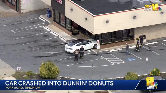 SkyTeam-11 is over a car that struck into a Dunkin' in Timonium.