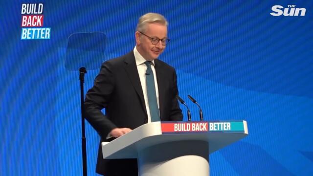 Michael Gove at it again as he dances arm-in-arm with MP