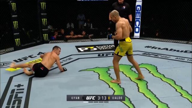 Jose Aldo drops Petr Yan with a leg kick