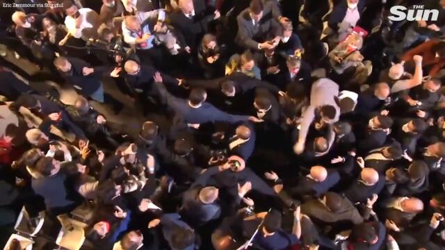 Macron challenger Eric Zemmour grabbed as violence erupts on campaign