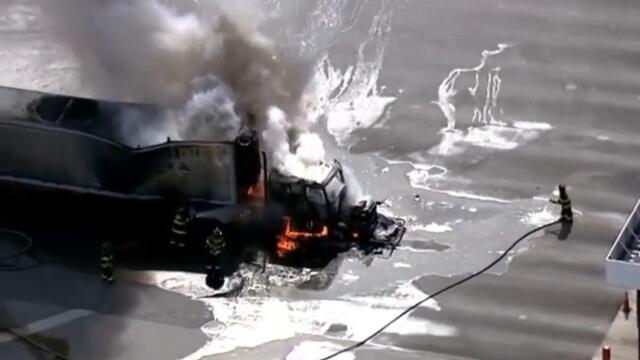 Flames engulf tractor-trailer near gas tanks in southeast Baltimore