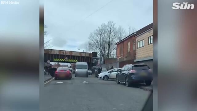 Gangs armed with 2ft SWORDS and bats fight in street in Birmingham