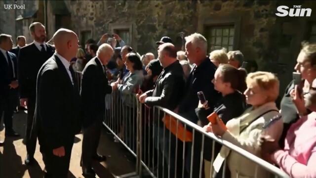 King Charles meets crowds and visits floral tributes at Holyrood Palace
