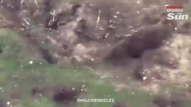 Ukrainian soldiers storm Russian trenches amid artillery explosions