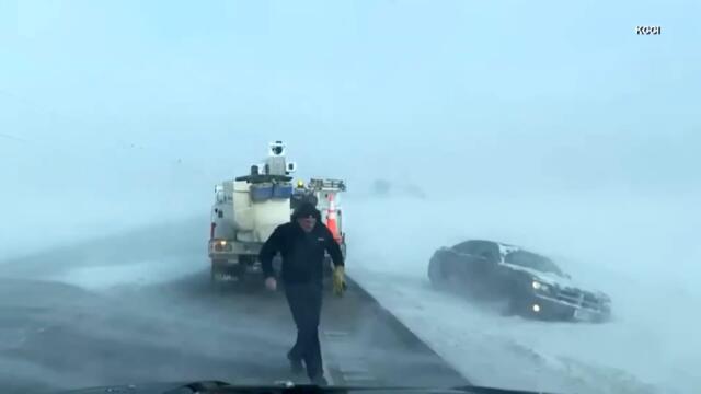 Storm Chaser Saves Couple That Slid Into a Ditch