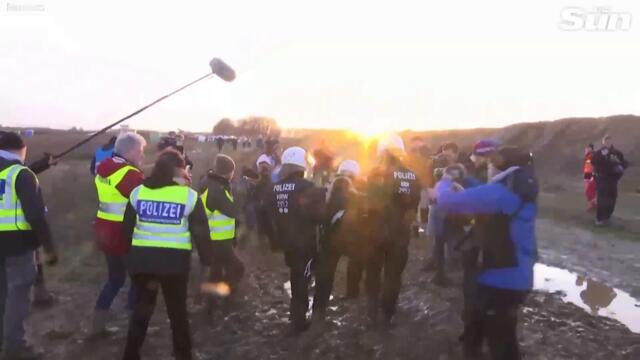 Greta Thunberg arrested by riot police at heated German coal mine protest