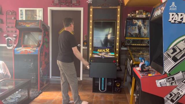 Opening the folding virtual pinball table and putting it away again.