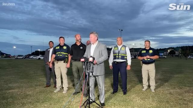 'School shooter's dad charged with MURDER over 'son's gun rampage' that killed 4