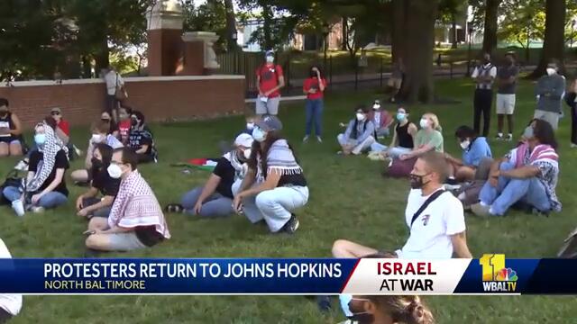 Demonstrators participate in national movement at Johns Hopkins
