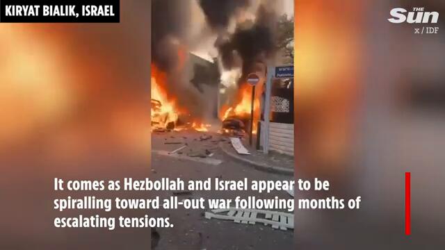 Israel hit by barrage of 100 Hezbollah rockets as all out war in Lebanon imminent