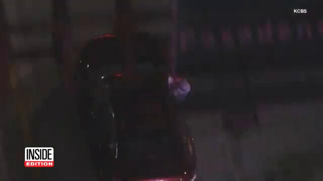 Man Sticks Out the Window During Police Pursuit