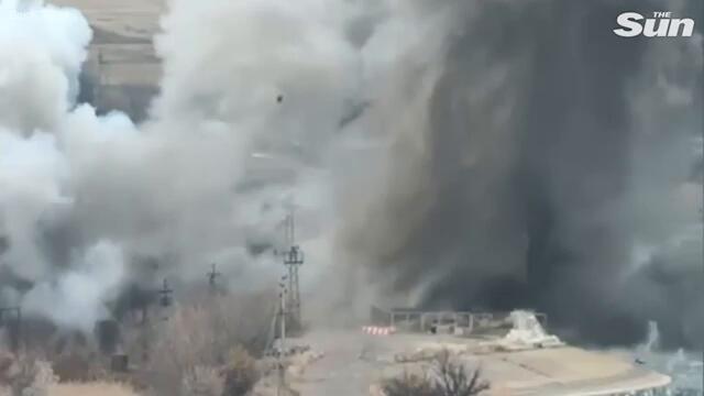Shocking moment Ukrainian dam is BLOWN UP ‘by Russian shelling’ flooding frontline villages as Putin