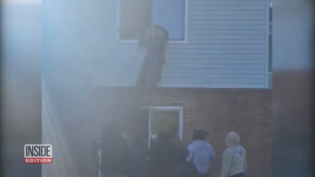 US Navy Sailor Scales Burning Building to Rescue Residents