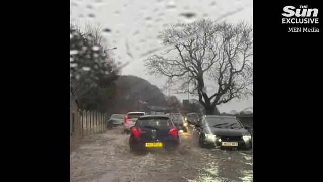 Mum’s horror as baby is trapped inside sinking car as streets turn into rivers