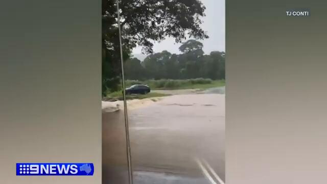 Heavy rain causes flooding, triggers landslide as cyclone looms | 9 News Australia