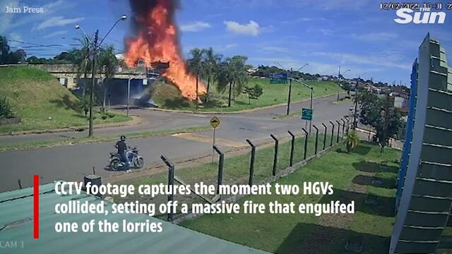 Moment driver leaps from bridge after lorry EXPLODES in terrifying crash